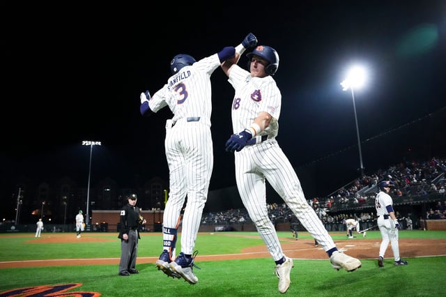 AUBURN, AL - FEBRUARY 20 - Auburn Outfielder Chris Stanfield (3) and Auburn Catcher Ike Irish (18) during the game between the Auburn Tigers and the UAB Blazers at Plainsman Park in Auburn, AL on Tuesday, Feb. 20, 2024.