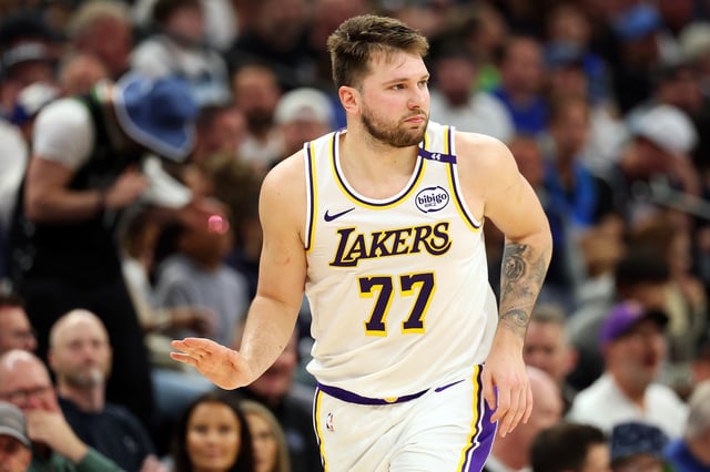Luka Doncic #77 of the Los Angeles Lakers reacts to his three-point basket against the Minnesota Timberwolves in the second quarter of Game Four of the First Round of the 2025 NBA Playoffs at Target Center on April 27, 2025 in Minneapolis, Minnesota.