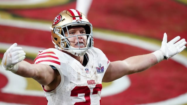 San Francisco 49ers running back Christian McCaffrey (23) celebrates after scoring a touchdown during Super Bowl LVIII at Allegiant Stadium..