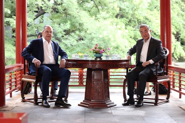 Russian Foreign Minister Sergei Lavrov and Chinese Foreign Minister Wang Yi attend a meeting on the sidelines of the Shanghai Cooperation Organisation (SCO) Foreign Ministers' Council meeting in Beijing, China July 13, 2025. Russian Foreign Ministry/Handout via REUTERS