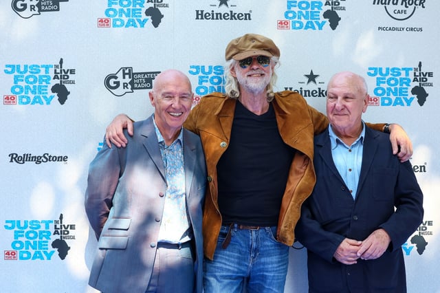 Harvey Goldsmith, Bob Geldof and Midge Ure arrive for a special performance of the musical "Just For One Day", marking the 40th anniversary of the 1985 fundraiser Live Aid, at the Shaftesbury Theatre, in London, Britain, July 13, 2025. REUTERS/Isabel Infantes
