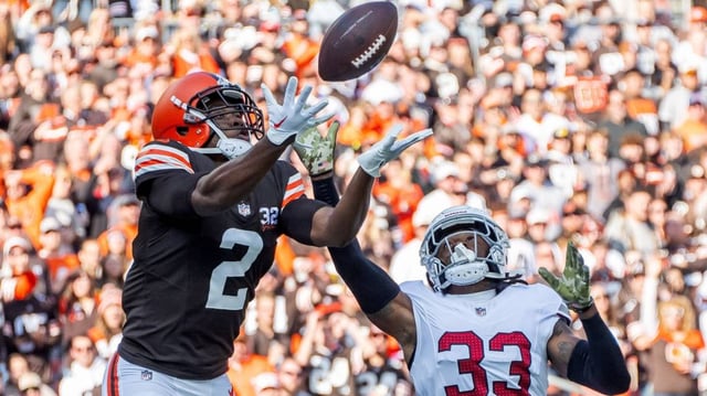 Cooper (2) catches a touchdown pass during his time with the Browns.Ken Blaze/Imagn Images