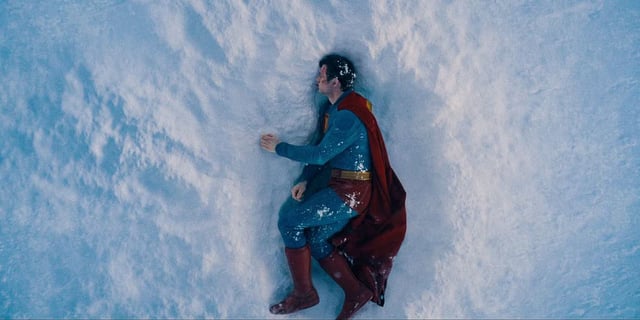 Superman lays beaten in the snow in Superman.