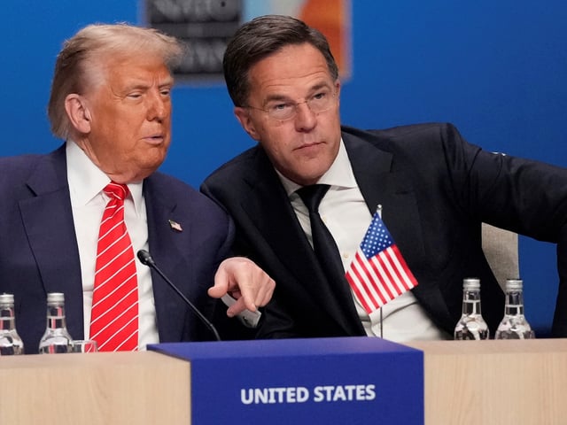President Donald Trump and NATO Secretary General Mark Rutte attend a plenary session at the NATO summit in The Hague, Netherlands, Wednesday, June 25, 2025. (AP Photo/Matthias Schrader)