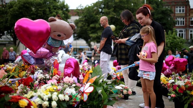 Tributes were left outside Southport’s town hall after the knife attack at a dance studio in July last year