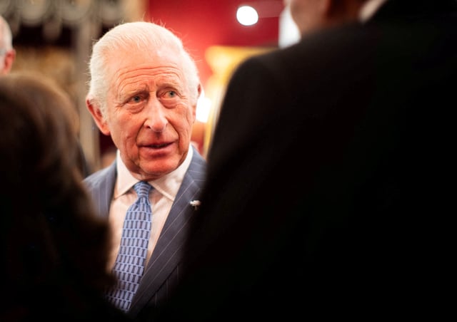 Britain's King Charles speaks with guests during a reception at St James's Palace to celebrate 25 years of the Royal Drawing School, in London, Britain, June 24, 2025. James Manning/Pool via REUTERS/File Photo
