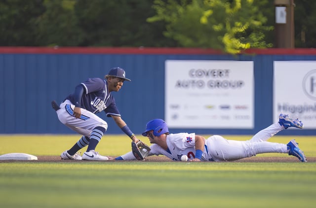 Westlake Chaparrals' Blake Peterson slides into second base ahead of the tag from SA Johnson Jaguars' Kayson Cunningham at the UIL Regional IV Final 6A baseball Round 1 playoff on June 1, 2023, at Westlake High School in West Lake Hills, TX.
