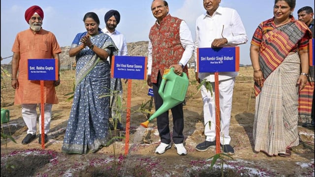 LG VK Saxena and chief minister Rekha Gupta at a bamboo plantation drive at Okhla landfill site on June 6. (PTI)
