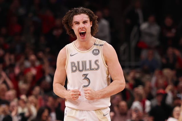 Josh Giddey #3 of the Chicago Bulls celebrates a basket against the Milwaukee Bucks during the second half at the United Center on December 28, 2024 in Chicago, Illinois.