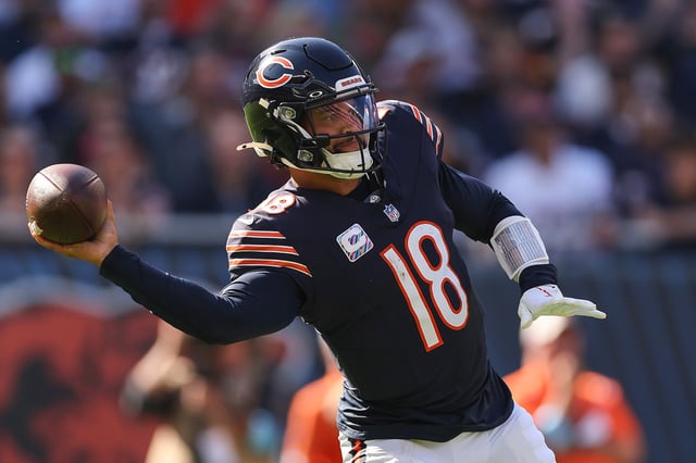 Caleb Williams #18 of the Chicago Bears throws a pass against the Carolina Panthers during the fourth quarter at Soldier Field on October 06, 2024 in Chicago, Illinois.