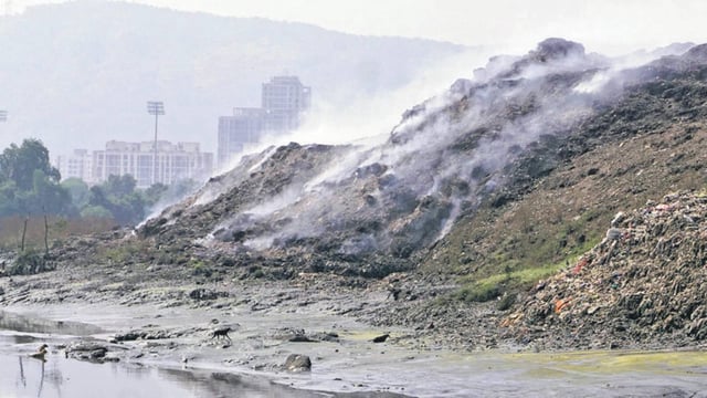 The garbage in the dump yard has been piled up since its closure in 2023. (HT Photo)