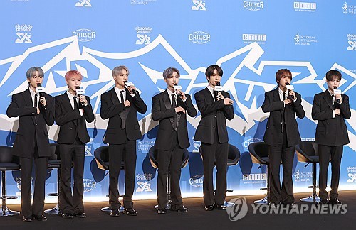K-pop boy group NCT Dream attends a press conference for its fifth full-length album, "Go Back to the Future," at a movie theater in Seoul on July 14, 2025. (Yonhap)