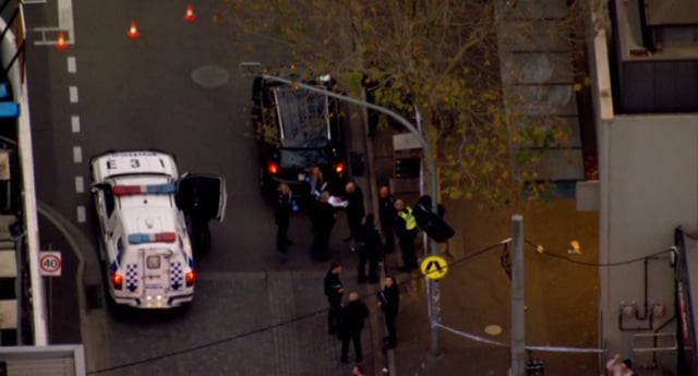 A man has been injured in a stabbing outside a shopping centre.
