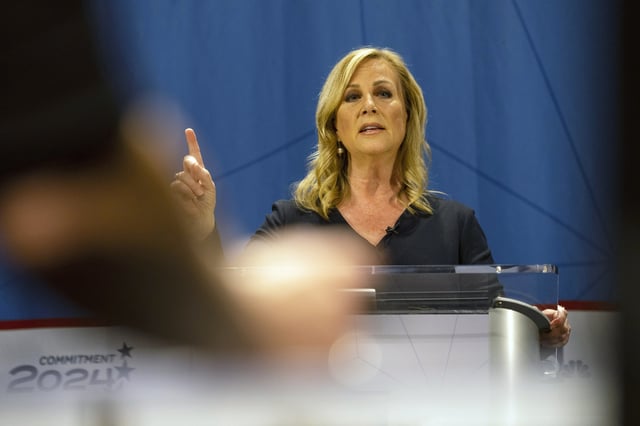 FILE - Janelle Stelson, a candidate for the Democratic nomination in Pennsylvania's 10th Congressional District, speaks during a debate on April 9, 2024 in York, Pa. (AP Photo/Joe Lamberti, File)