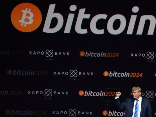 Republican presidential nominee and former U.S. President Donald Trump gestures at the Bitcoin 2024 event in Nashville, Tennessee, U.S., July 27, 2024. REUTERS/Kevin Wurm/File Photo