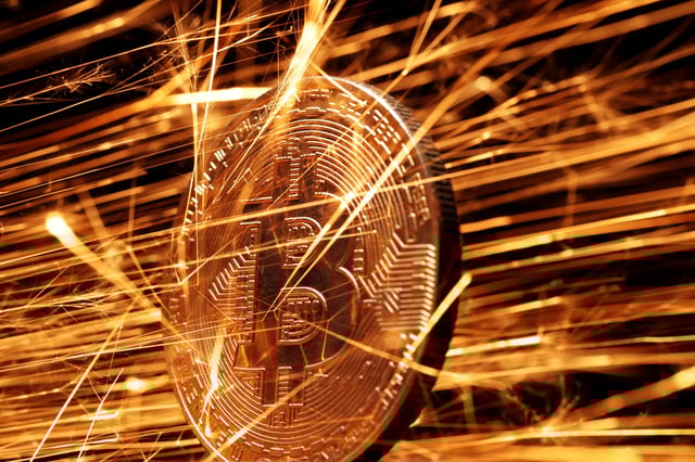 Sparks strike representation of cryptocurrency Bitcoin in this illustration taken November 24, 2024. REUTERS/Dado Ruvic/Illustration/File Photo