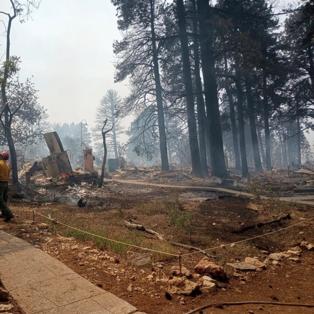 This photo provided by National Park Service shows the charred remains of a building at the North Rim of Grand Canyon National Park, in northern Arizona, on Sunday, July 13, 2025. (National Park Service via AP)