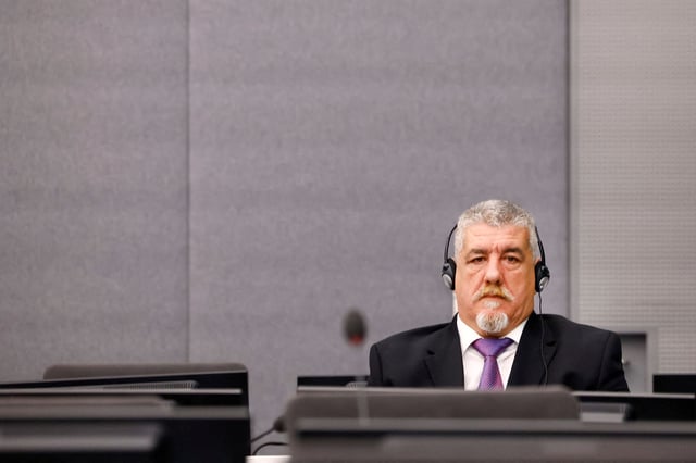 Former Kosovo Liberation Army (KLA) member Pjeter Shala attends his trial while judges at the Kosovo Specialist Chambers will hand down a judgment in The Hague, Netherlands, July 16 2024. REUTERS/Piroschka van de Wouw/Pool/File Photo