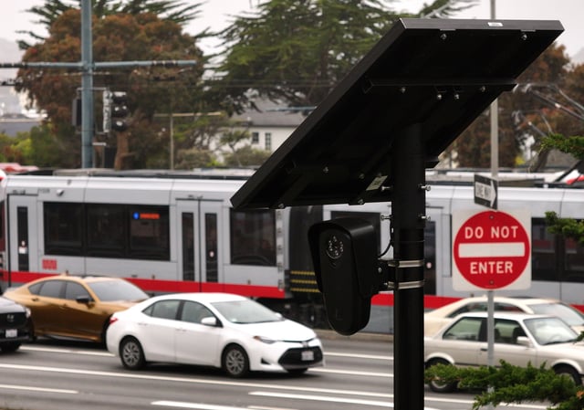 SAN FRANCISCO, CALIFORNIA - JUNE 13: In an aerial view, n automated license plate reader is seen mounted on a pole on June 13, 2024 in San Francisco, California. The city of San Francisco has installed 100 automated license plate readers across the city and plans to install 300 more in the coming weeks as officials look to technology to help combat crime in the city. (Photo by Justin Sullivan/Getty Images)