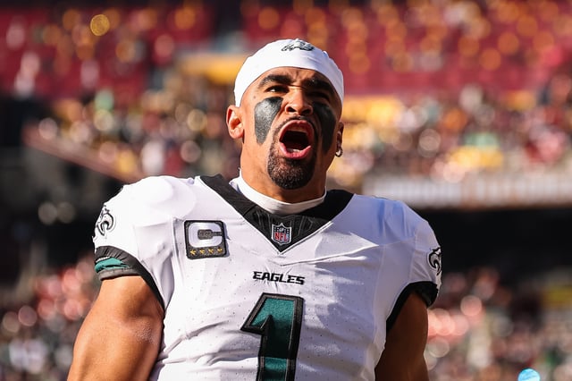 Jalen Hurts #1 of the Philadelphia Eagles reacts before the game against the Washington Commanders at Northwest Stadium on December 22, 2024 in Landover, Maryland