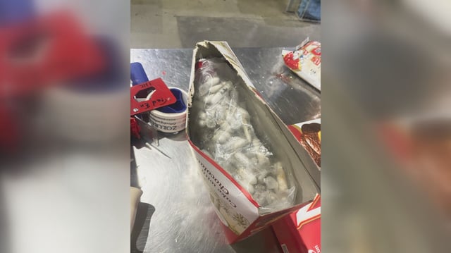 This photo dated June 18, 2025 and provided by the main customs office Cologne, shows plastic containers holding young tarantulas that had been hidden in chocolate sponge-cake boxes shipped to Cologne Bonn airport, western Germany. 
