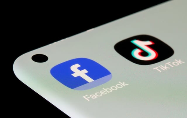 Facebook, TikTok apps are seen on a smartphone in this illustration taken, July 13, 2021. REUTERS/Dado Ruvic/Illustration/File Photo