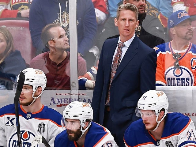 Head coach Kris Knoblauch of the Edmonton Oilers watches second-period action against the Florida Panthers in Game 3 of the 2025 Stanley Cup Final.
