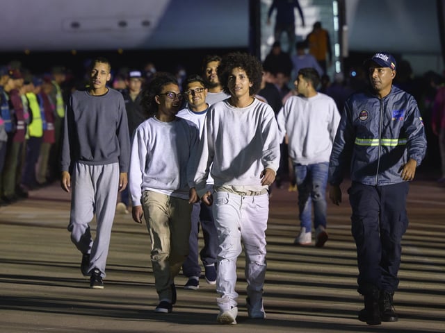 Deported individuals from the US arrive on a flight at Simon Bolivar International Airport (CCS) in Maiquetia, Vargas state, Venezuela, early on Monday, March 24, 2025. Deportation flights from the US resumed on Sunday after an agreement was reached between the two governments, according to a top Venezuelan official. Photographer: Bloomberg