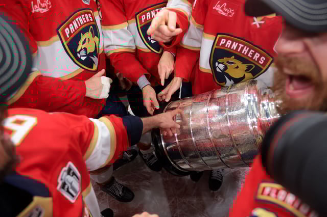 Jun 17, 2025; Sunrise, Florida, USA; The Florida Panthers look at the Stanley Cup after winning game six of the 2025 Stanley Cup Final against the Edmonton Oilers at Amerant Bank Arena. Mandatory Credit: Sam Navarro-Imagn Images
