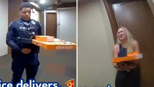 The footage shows two officers walking up to a home with pizza in hand and knocking on the door.