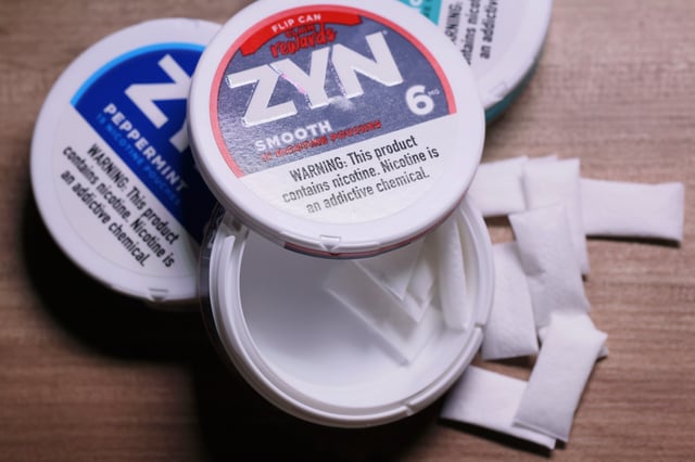 NEW YORK, NEW YORK - JANUARY 29: In this photo illustration, ZYN nicotine cases and pouches are seen on a table on January 29, 2024 in New York City. Sen. Chuck Schumer (D-NY) is calling for federal action on ZYN, a popular nicotine pouch in the United States. The senator is asking the FTC and FDA to investigate the companies marketing and the health effects of the nicotine pouch. (Photo Illustration by Michael M. Santiago/Getty Images)