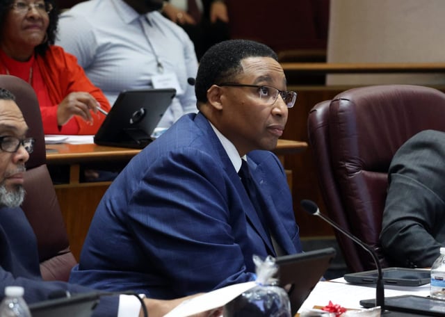 Chicago Ald. Jason Ervin, 28th, watches votes during a City Council meeting at City Hall on Dec. 16, 2024. (Terrence Antonio James/Chicago Tribune)