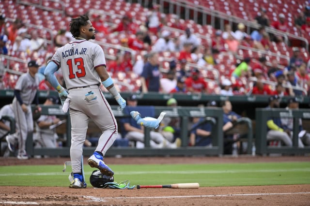 Jul 13, 2025; St. Louis, Missouri, USA;  Atlanta Braves right fielder Ronald Acuna Jr (13) tosses his gear after striking out to end the seventh inning against the St. Louis Cardinals at Busch Stadium. Mandatory Credit: Jeff Curry-Imagn Images/File Photo