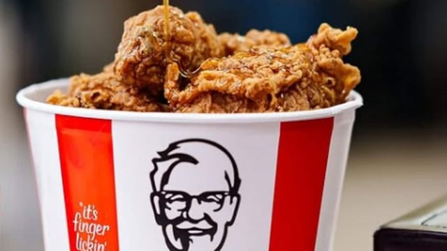 Customers can redeem a free KFC bucket by spending $15 online at KFC.com or the app. 