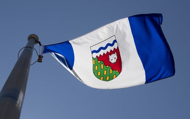 The Northwest Territories flag flies on a flag pole in Ottawa,  Monday July 6, 2020. THE CANADIAN PRESS/Adrian Wyld