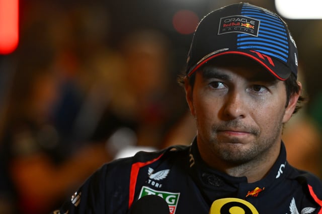 10th placed qualifier Sergio Perez of Mexico and Oracle Red Bull Racing talks to the media in the Paddock after qualifying ahead of the F1 Grand Prix of Abu Dhabi at Yas Marina Circuit on December 07, 2024 in Abu Dhabi, United Arab Emirates.