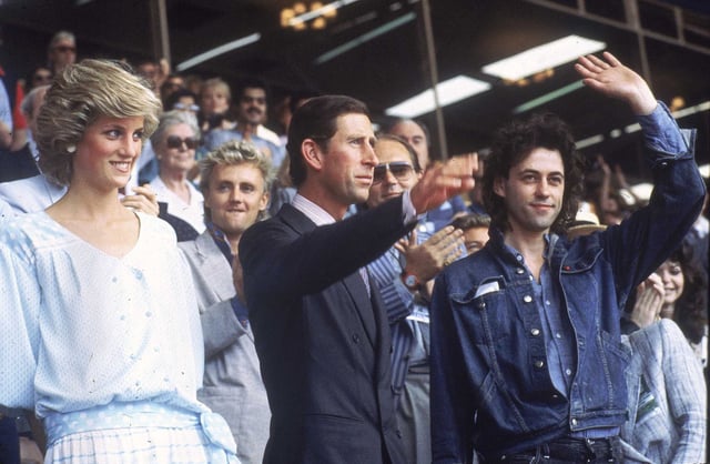 - Princess Diana, left, and Prince Charles attend the Live Aid concert as they acknowledge the crowd with event organizer Bob Geldof, right, at London’s Wembley Stadium, on July 13, 1985.