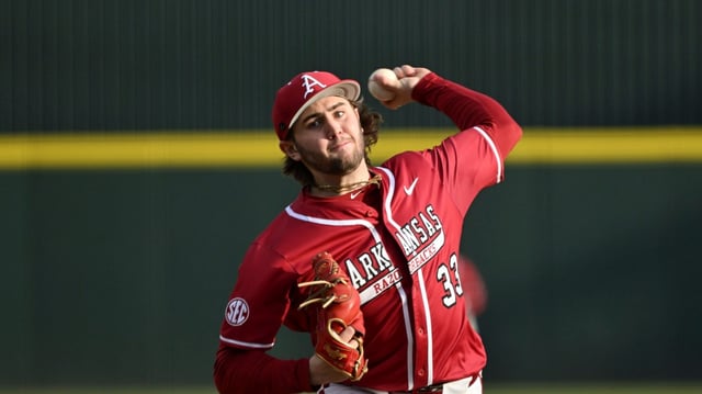 Arkansas pitcher Zach Root, shown pitching against Washington State in February in Fayetteville, Ark. was selected 40th overall by the Dodgers in the MLB draft on Sunday. “I couldn’t be happier. This was my favorite team growing up, and I’m happy to be a Dodger,” Root said. (AP Photo/Michael Woods)