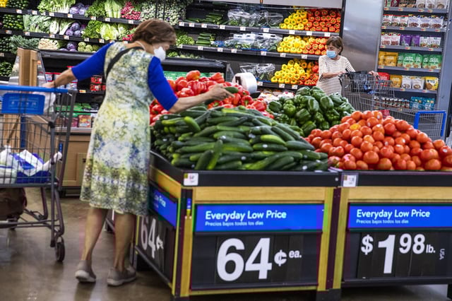FILE – People buy groceries at a Walmart Superstore in Secaucus, New Jersey, July 11, 2024. 