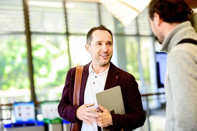 Jeziorski speaks with a student after teaching his Marketing Analytics class in spring 2023. (Photo: Noah Berger)