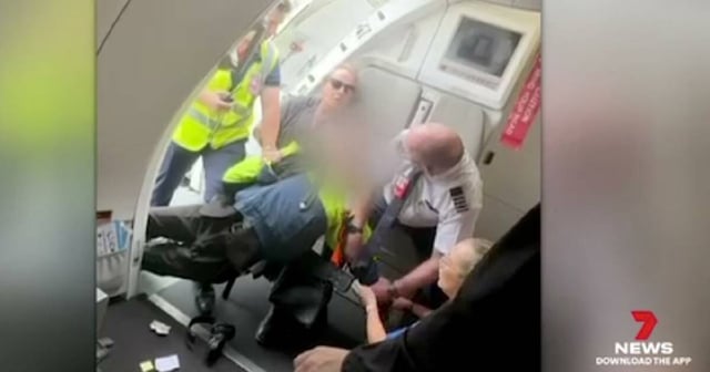 The boy was tackled by plane passengers and staff before Victoria Police took him into custody. (HANDOUT/7NEWS)