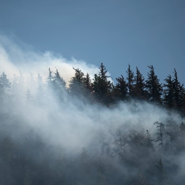 Smoke from the Dryden Creek Wildfire, photographed just north of Squamish, B.C., on Wednesday, June 11, 2025. THE CANADIAN PRESS/ Tijana Martin