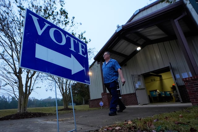 FILE - A voter leaves a polling location after voting Tuesday, Nov. 5, 2024, in Rutledge, Ga. (AP Photo/John Bazemore, File)
