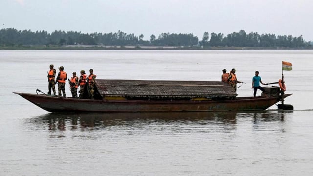 BSF personnel patrol the Gangadhar river near the India-Bangladesh border. (AFP)