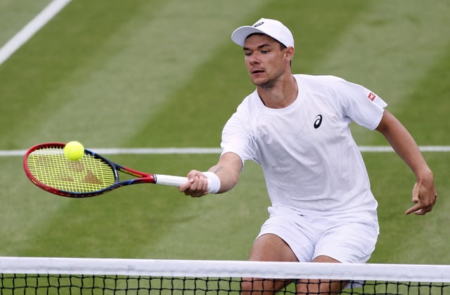 Tennis - Wimbledon - All England Lawn Tennis and Croquet Club, London, Britain - July 6, 2025 Poland's Kamil Majchrzak in action during his round of 16 match against Russia's Karen Khachanov REUTERS/Stephanie Lecocq/File Photo