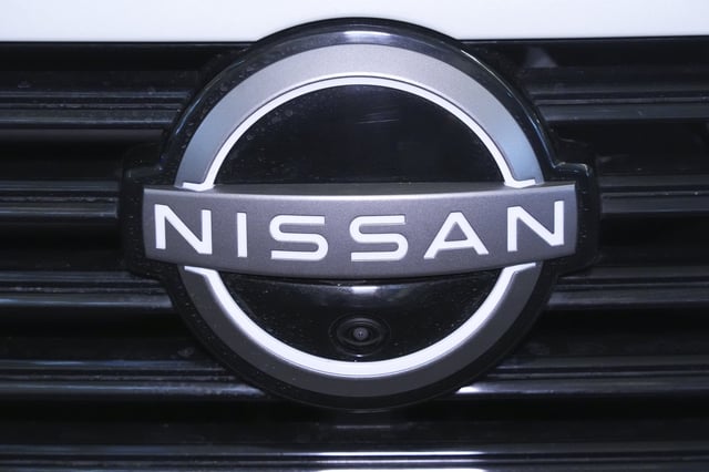 FILE - This is the Nissan logo on the grill of a 2025 Nissan Murano Platinum SUV on display at the Pittsburgh International Auto Show in Pittsburgh, Feb. 14, 2025. (AP Photo/Gene J. Puskar, File)