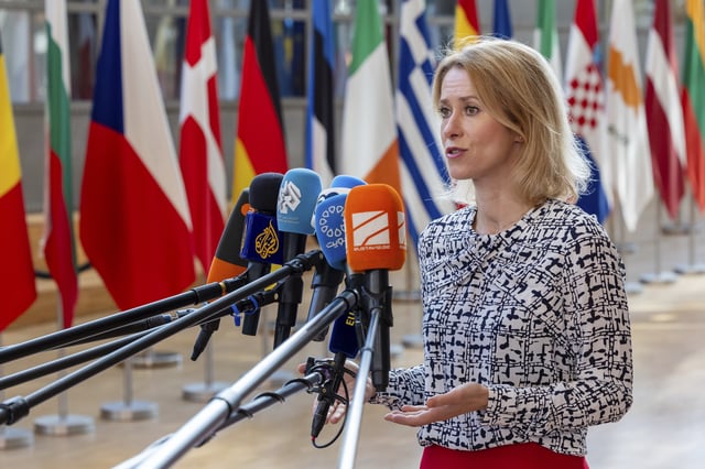 European Union foreign policy chief Kaja Kallas talks with journalists as she arrives for an EU foreign ministers meeting at the EU Council building in Brussels, Tuesday, July 15, 2025. (AP Photo/Geert Vanden Wijngaert)