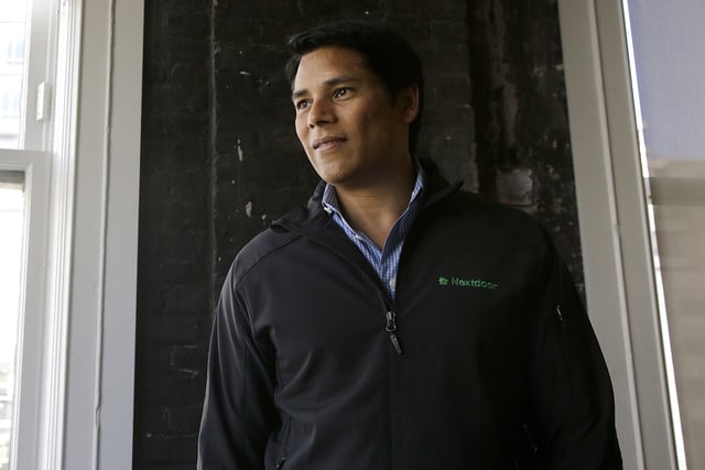 FILE - Nextdoor CEO Nirav Tolia poses for photos at his office in San Francisco on May 11, 2016. (AP Photo/Jeff Chiu, File)
