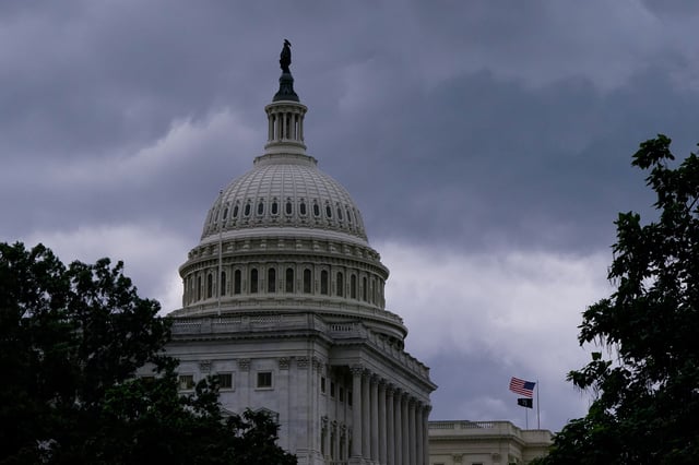 The U.S. Capitol building is seen as a thunderstorm rolls through Washington, D.C., U.S., July 1, 2025.  REUTERS/Elizabeth Frantz/File Photo