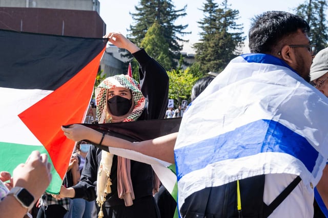 A walkout by UC Berkeley faculty, staff and students in support of Gaza and Lebanon was interrupted by counter protestors from Students Supporting Israel on Oct. 8, 2024.